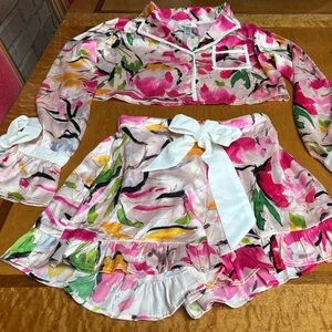 Beach Riot Anthropologie Pajama set, floral with ruffles and white ties.